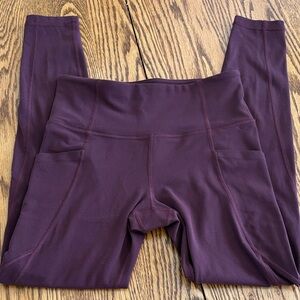 Athleta women’s mid-rise Stash Pocket Salutation 7/8 tight. Small tall.